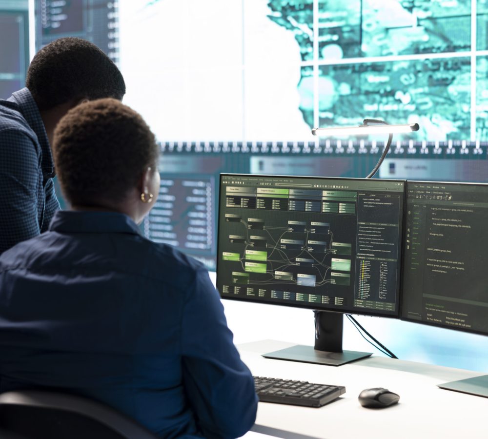 Cyber investigation team working in a governmental hacking room, working on computer security and phishing detection. Emphasizing online security, digital threats and malware prevention.